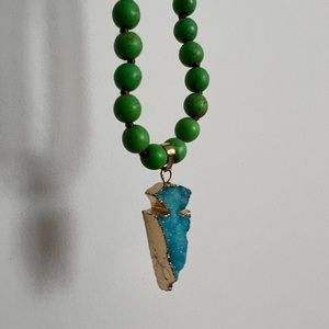 Beautiful vibrant colored necklace. Turquoise stone with vibrant green beading.